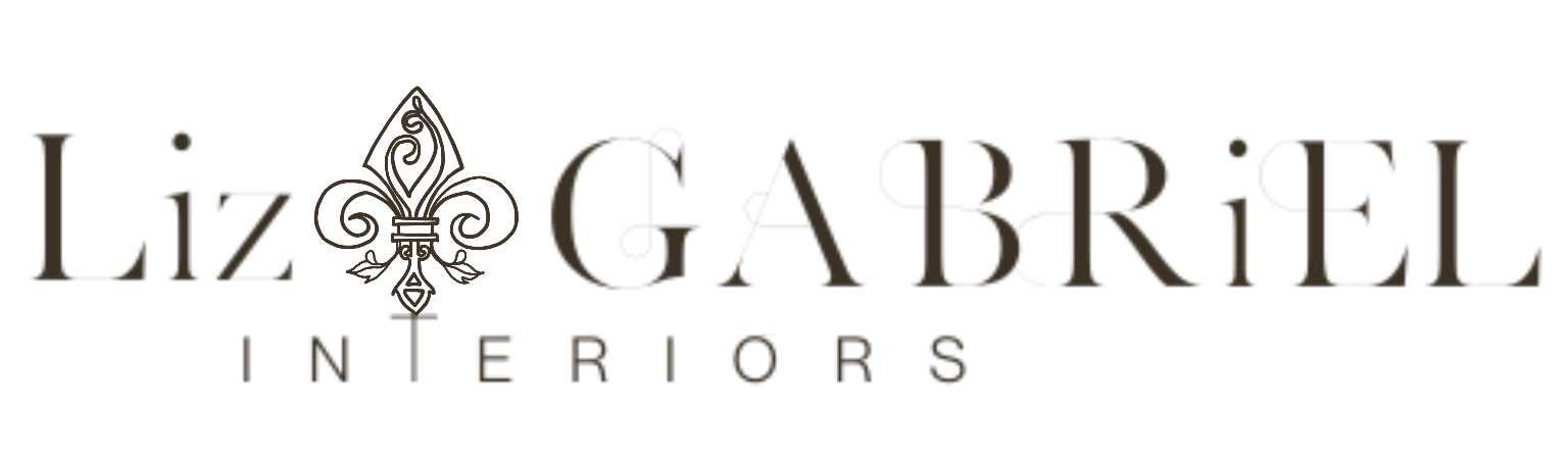 The logo for liz gabriel interiors has a fleur de lis on it.