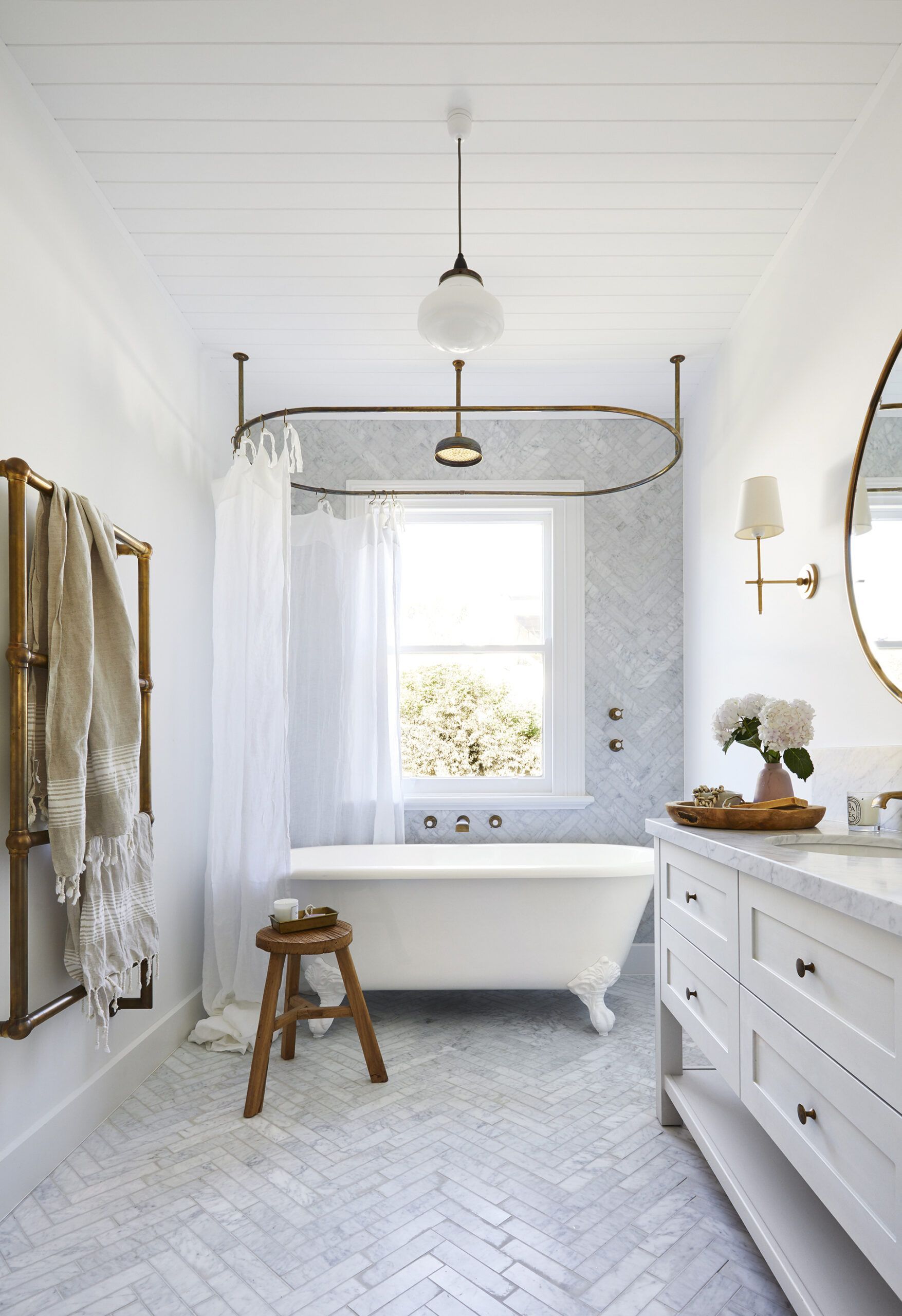 A Bathroom With A Toilet , Sink And Mirror — Ultimate Bathrooms Ballarat In Alfredton, VIC