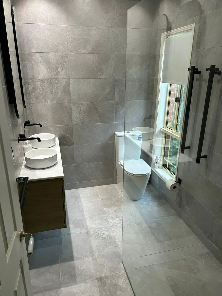 A Bathroom With Two Sinks , A Toilet , And A Walk In Shower — Ultimate Bathrooms Ballarat In Alfredton, VIC