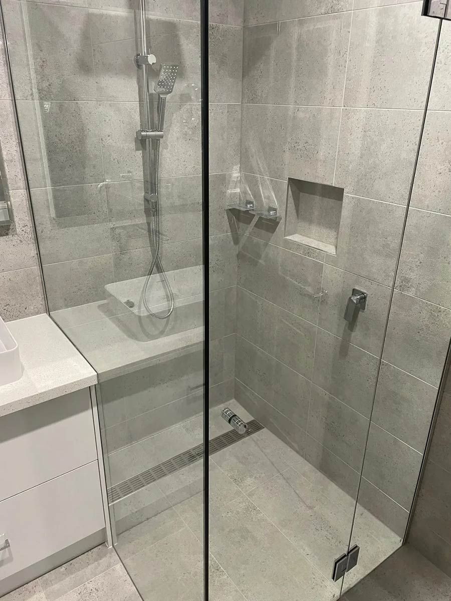 A Bathroom With A Walk In Shower And A Sink — Ultimate Bathrooms Ballarat In Alfredton, VIC