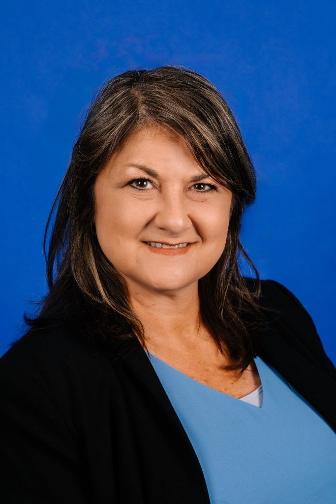 A silhouette of a woman without a face on a white background.