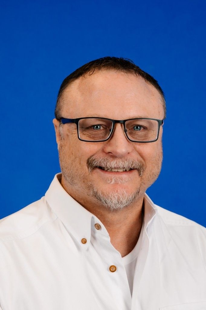 A silhouette of a man 's head on a white background.