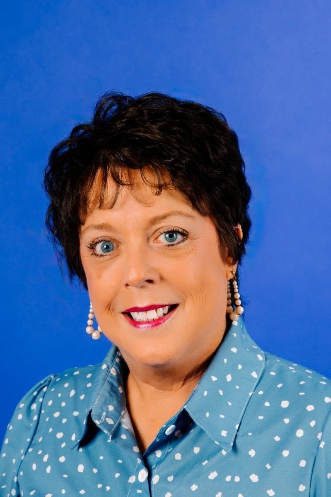 A silhouette of a woman without a face on a white background.