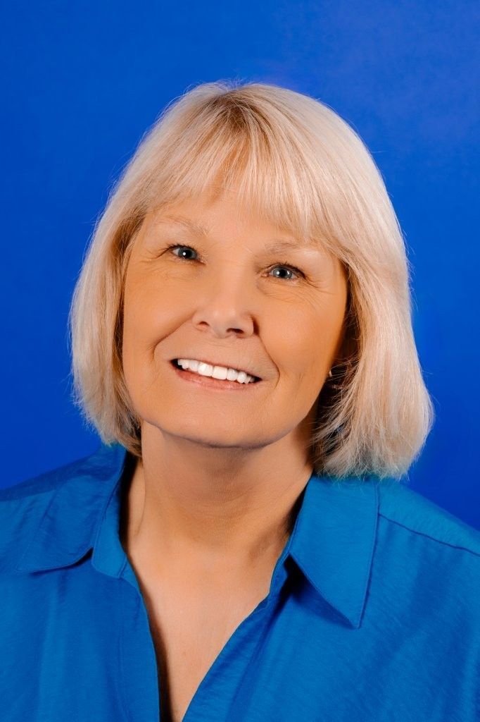 A silhouette of a woman without a face on a white background.