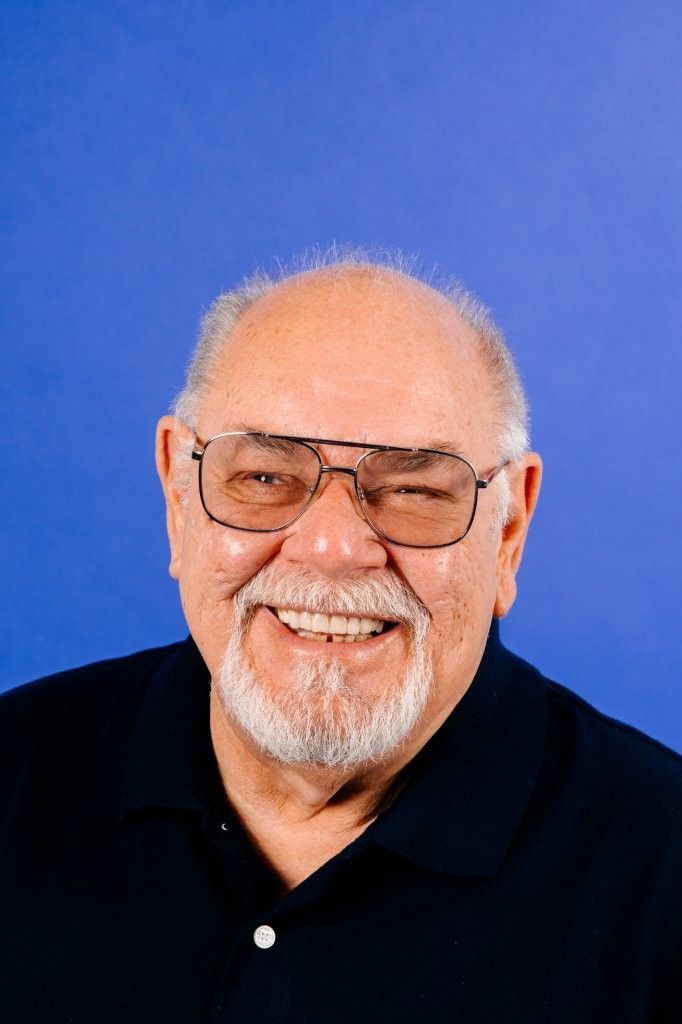 A silhouette of a man 's head on a white background.