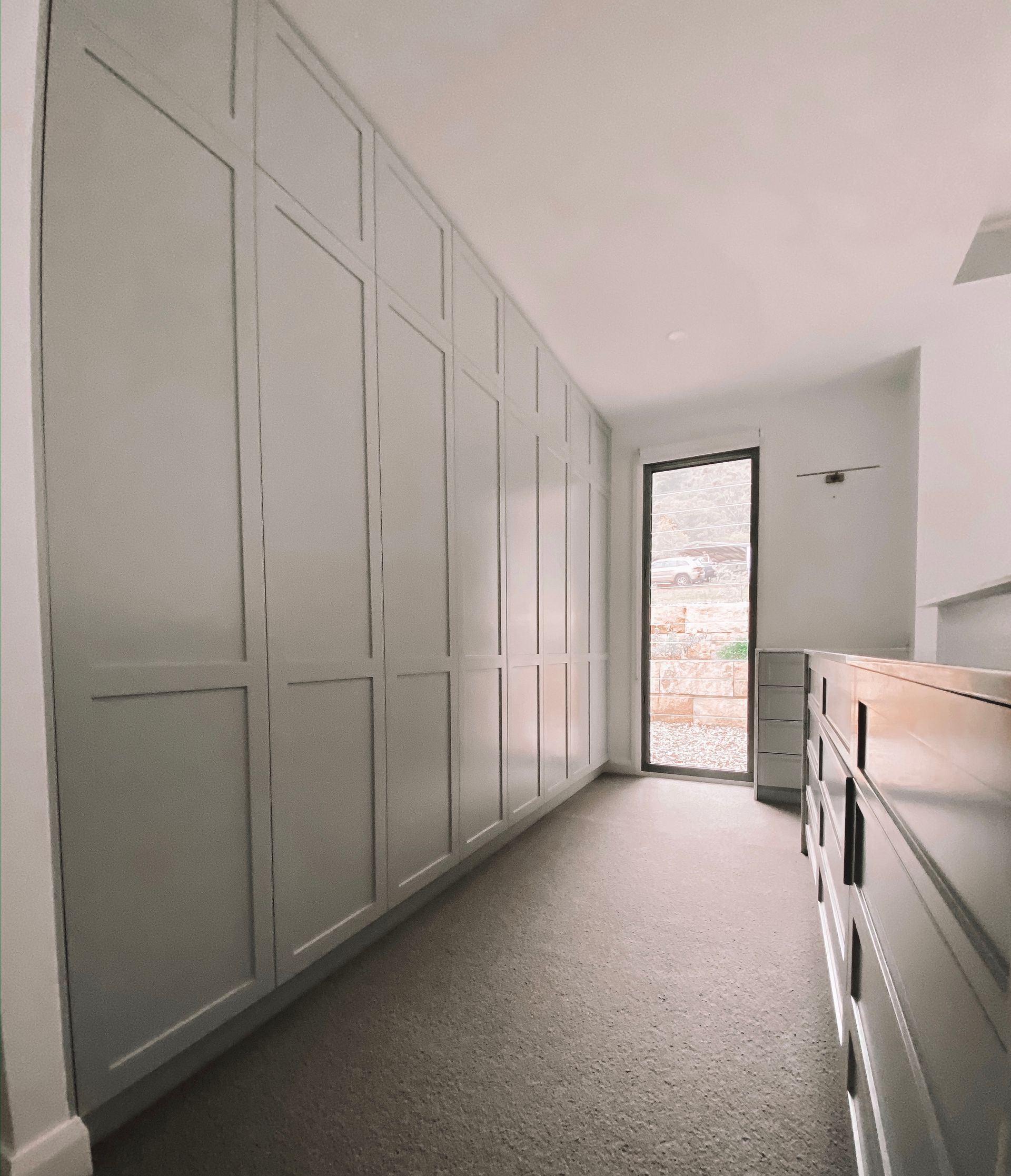 Laundry With Large Bench and Backyard Access — Custom Home Builders in the Hunter Valley