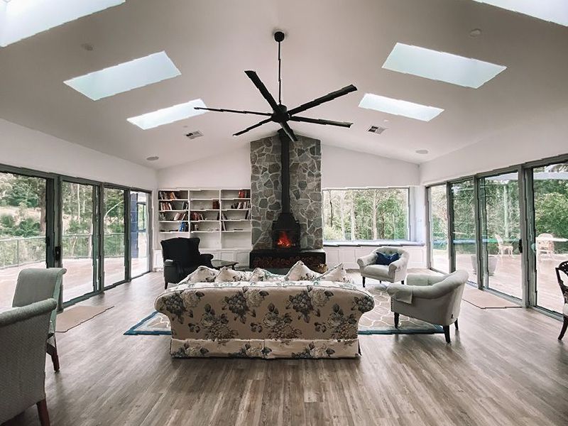 Spacious Living Area With a Large Ceiling Fan — Custom Home Builders in the Hunter Valley