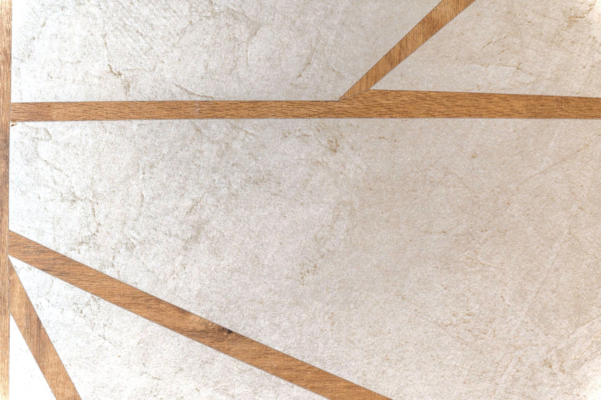 Eine Nahaufnahme einer Fliese mit einem geometrischen Muster.