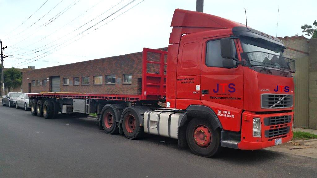 An image of a truck driving down a road and an image of a truck next to a stack of shipping containers.