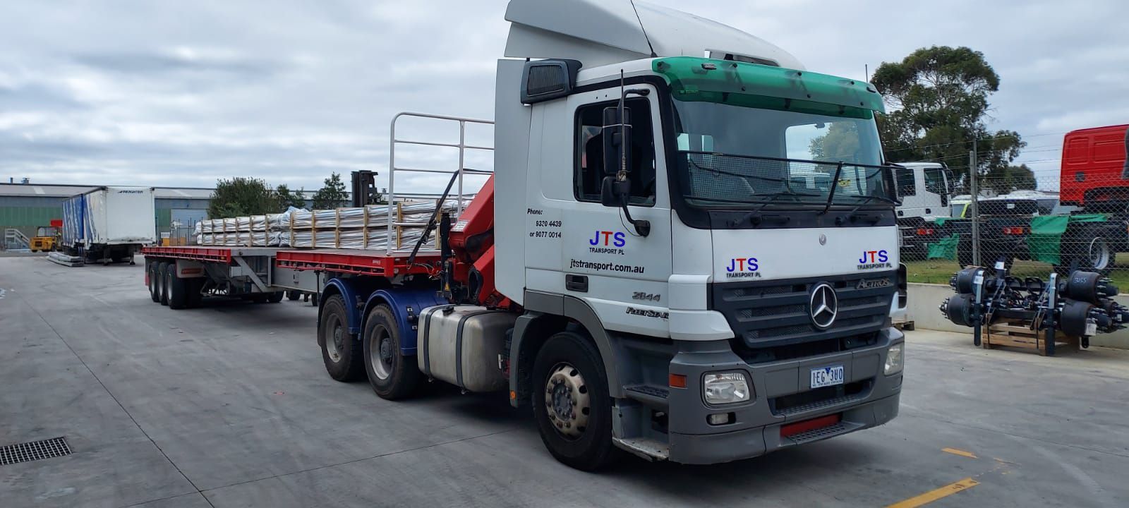Two images of trucks transporting containers.