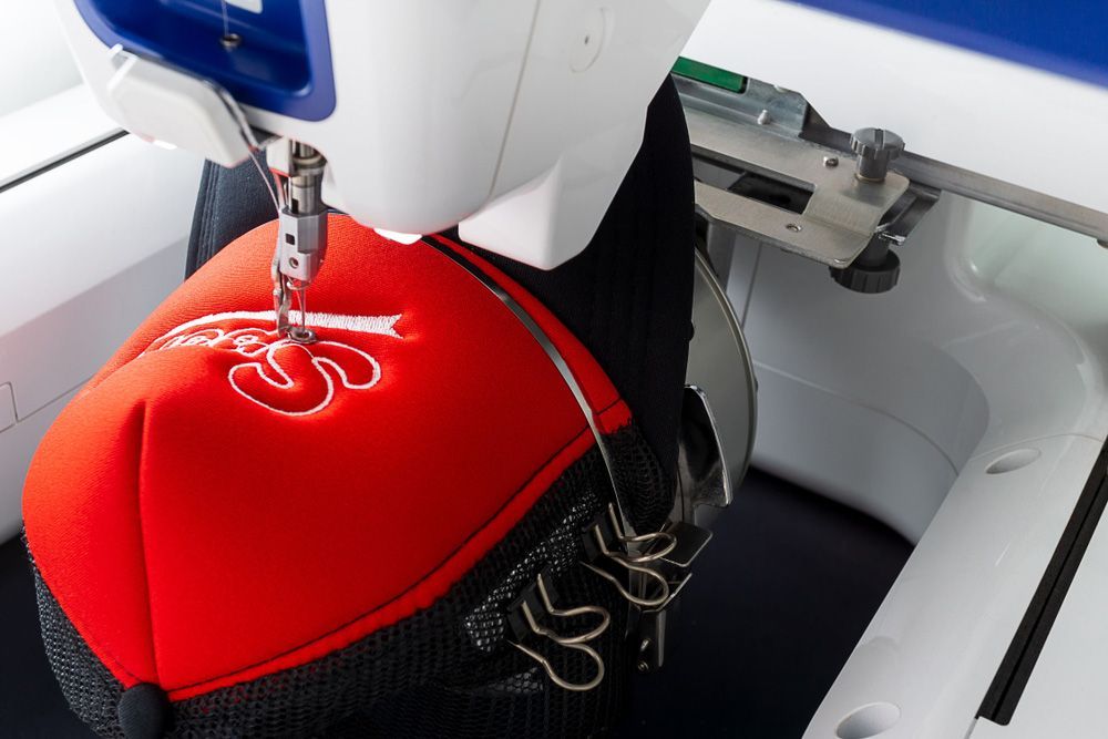 Embroidering a Logo Using a Sewing Machine — Uniforms2U in Penrith, NSW