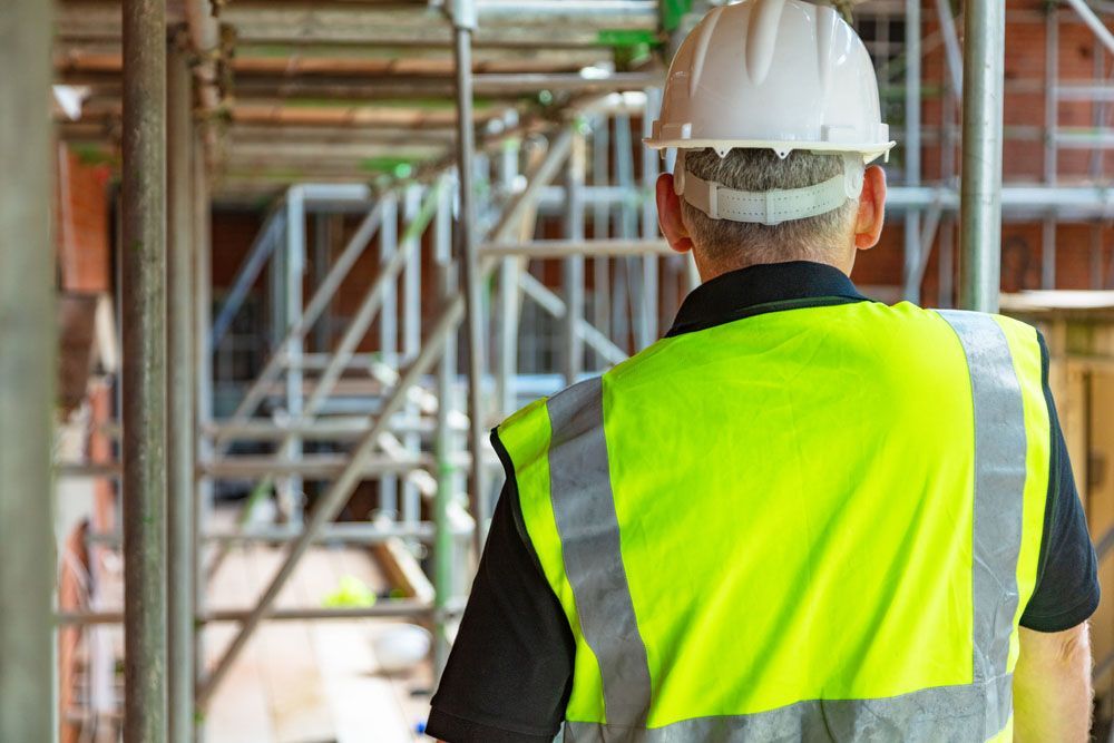 Construction Worker Wearing Safety Vest — Uniforms2U in Penrith, NSW