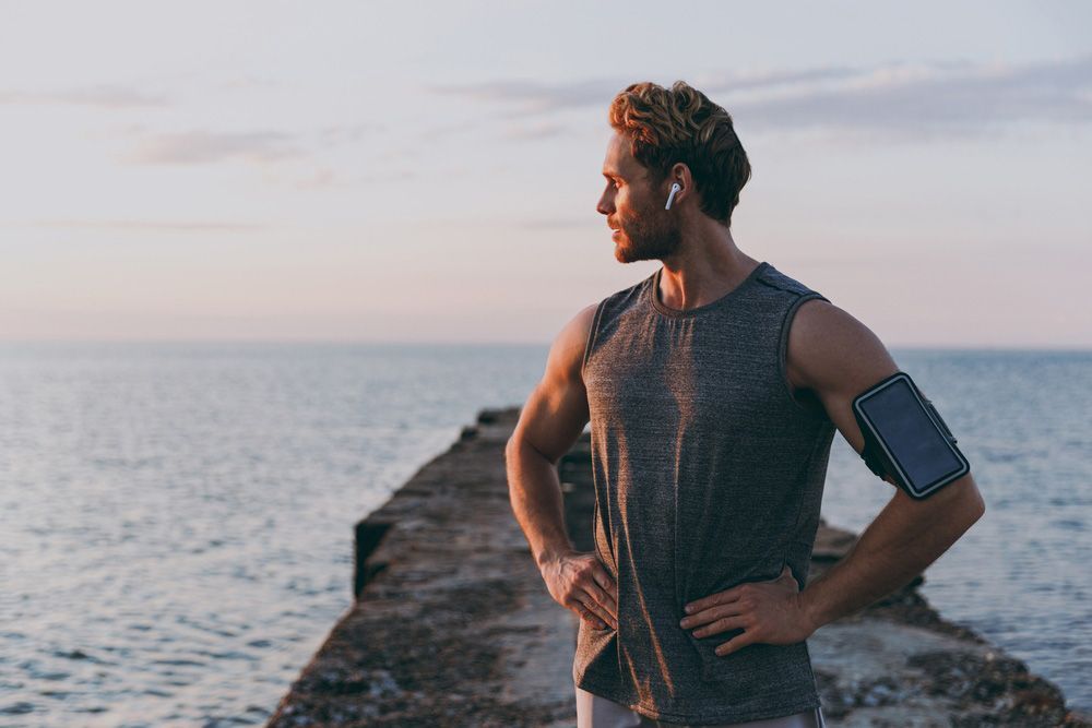 Man in Sports Attire Standing on a Pier — Uniforms2U in Blacktown, NSW