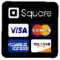 A black square with four credit cards on it.