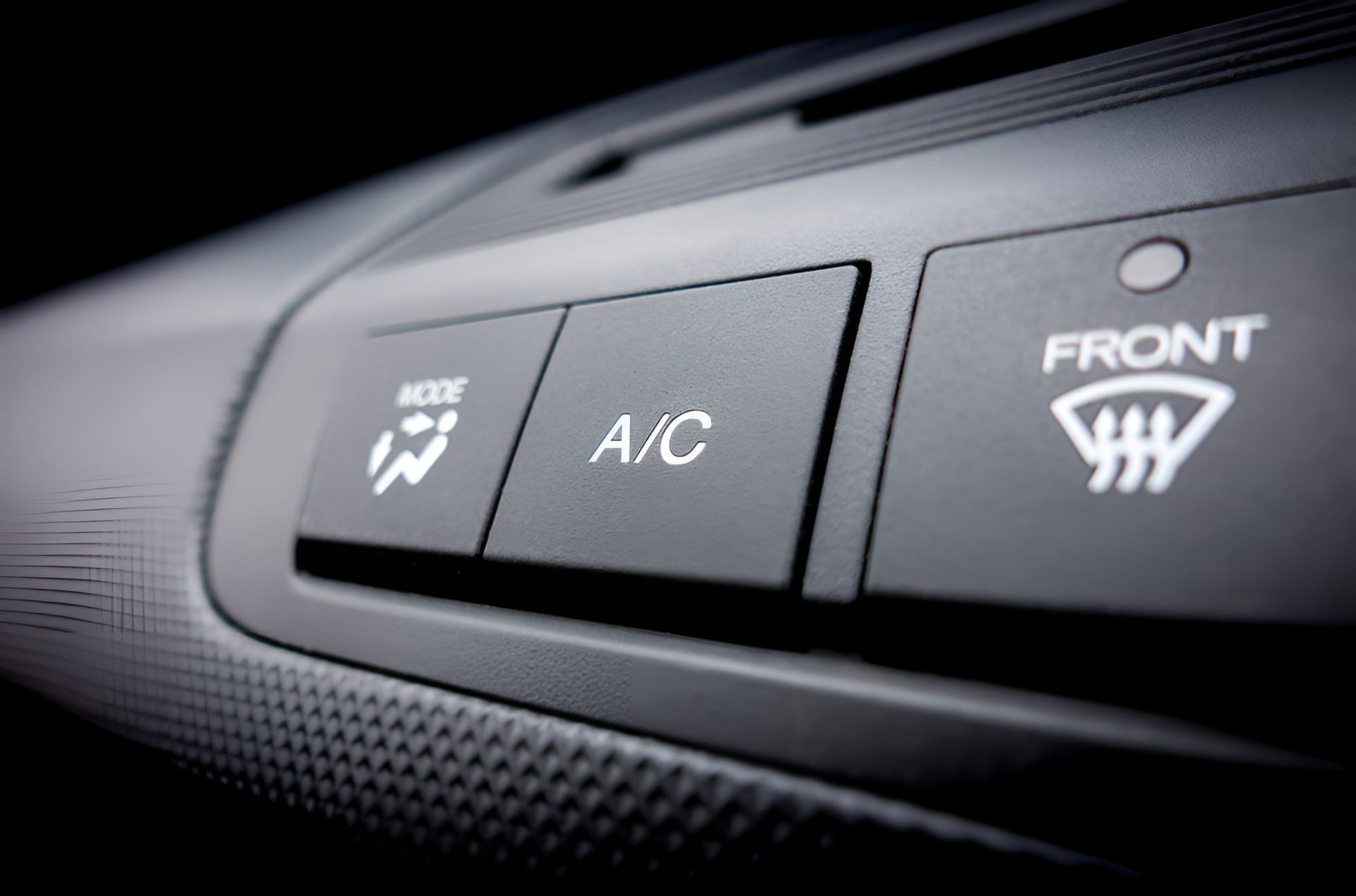 A Close Up Of A A/C Button On A Car — Lismore Tecnicair In South Lismore, NSW