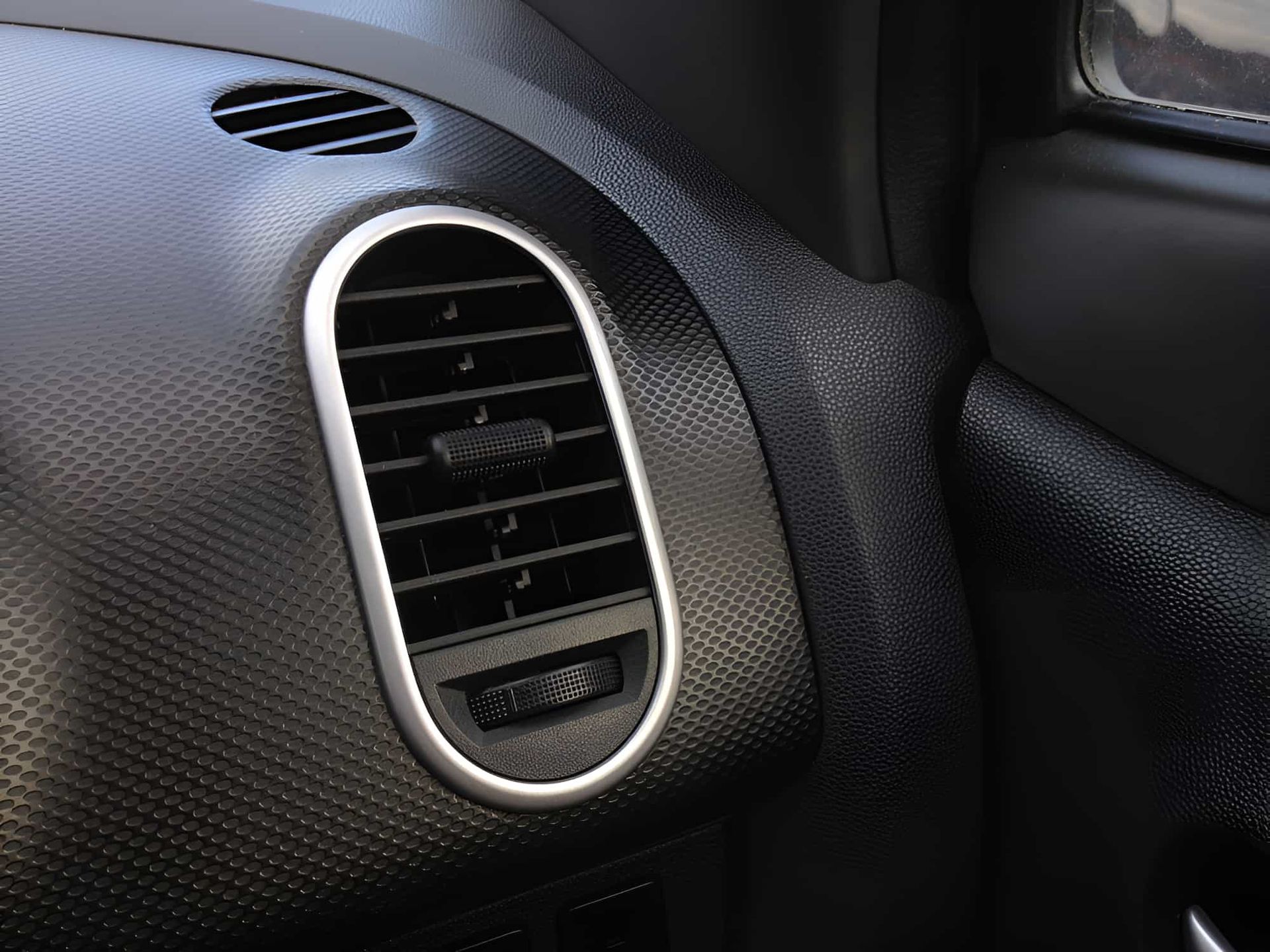 A Close Up Of An Air Conditioner On The Side Of A Car — Lismore Tecnicair In South Lismore, NSW