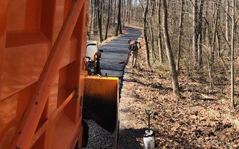 Men During Asphalt Application — Richmond, VA — Absolute Asphalt