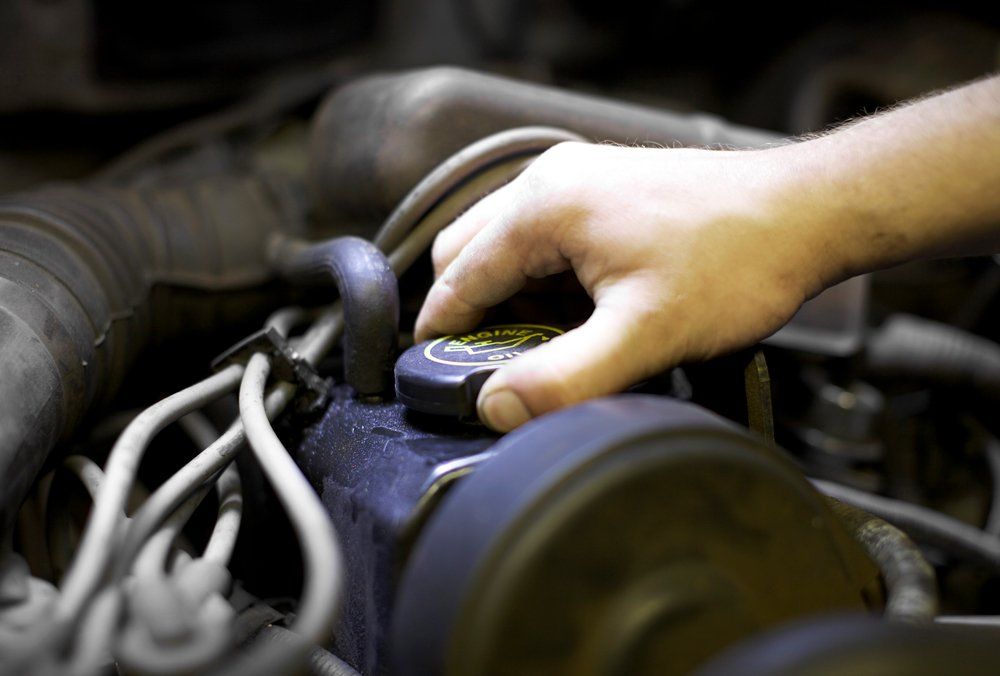 Mechanic Opening the Lid on Engine — Sun Valley, CA — Sun Valley Auto Body