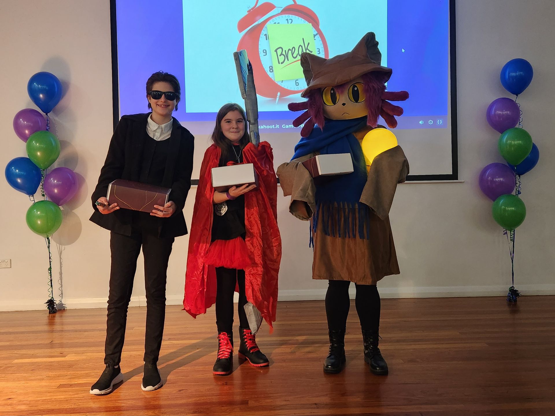 Three young people dressed in Cosplay 