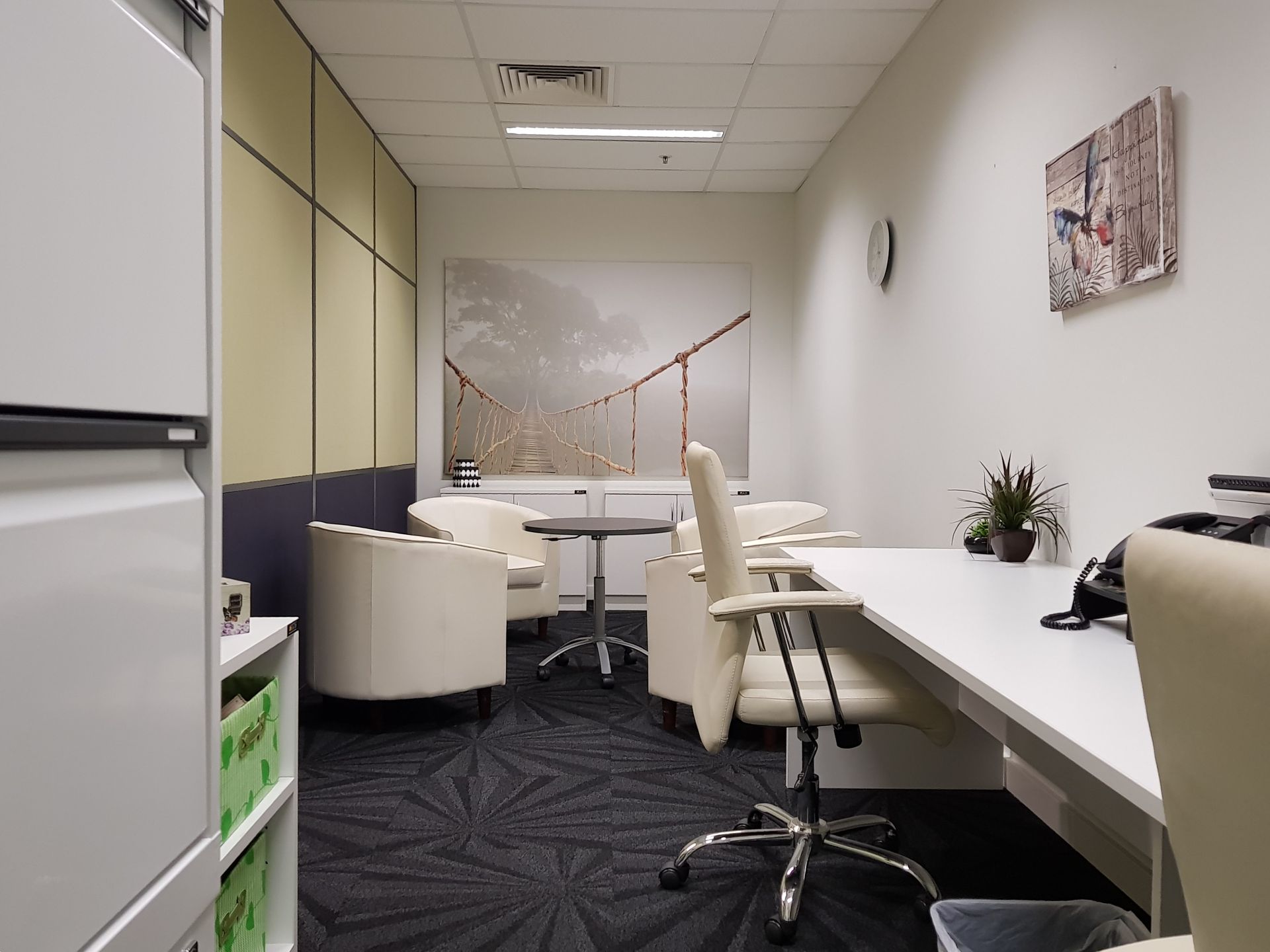 Well lit office space with office furniture