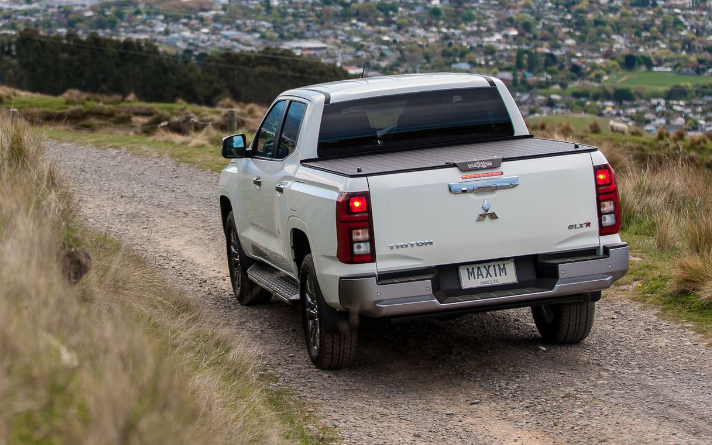 Mitsubishi Triton with MAXIM Hard Lid on a country road