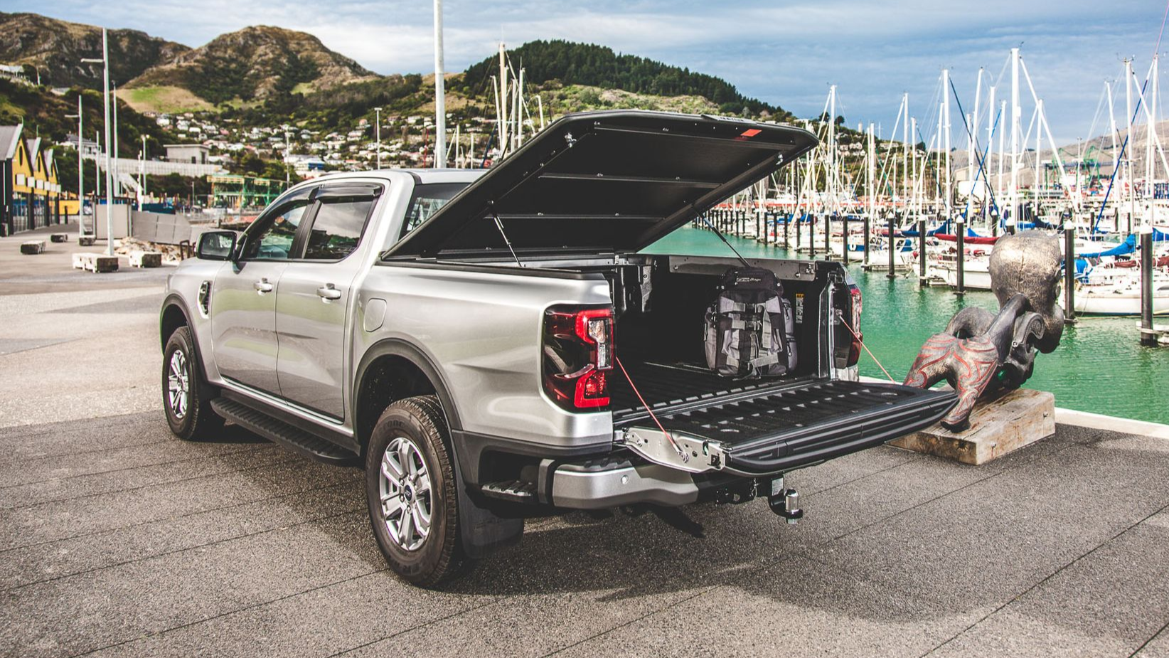 Ford Range with MAXIM Hard Lid on a wharf.