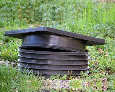 Black plastic septic tank cover