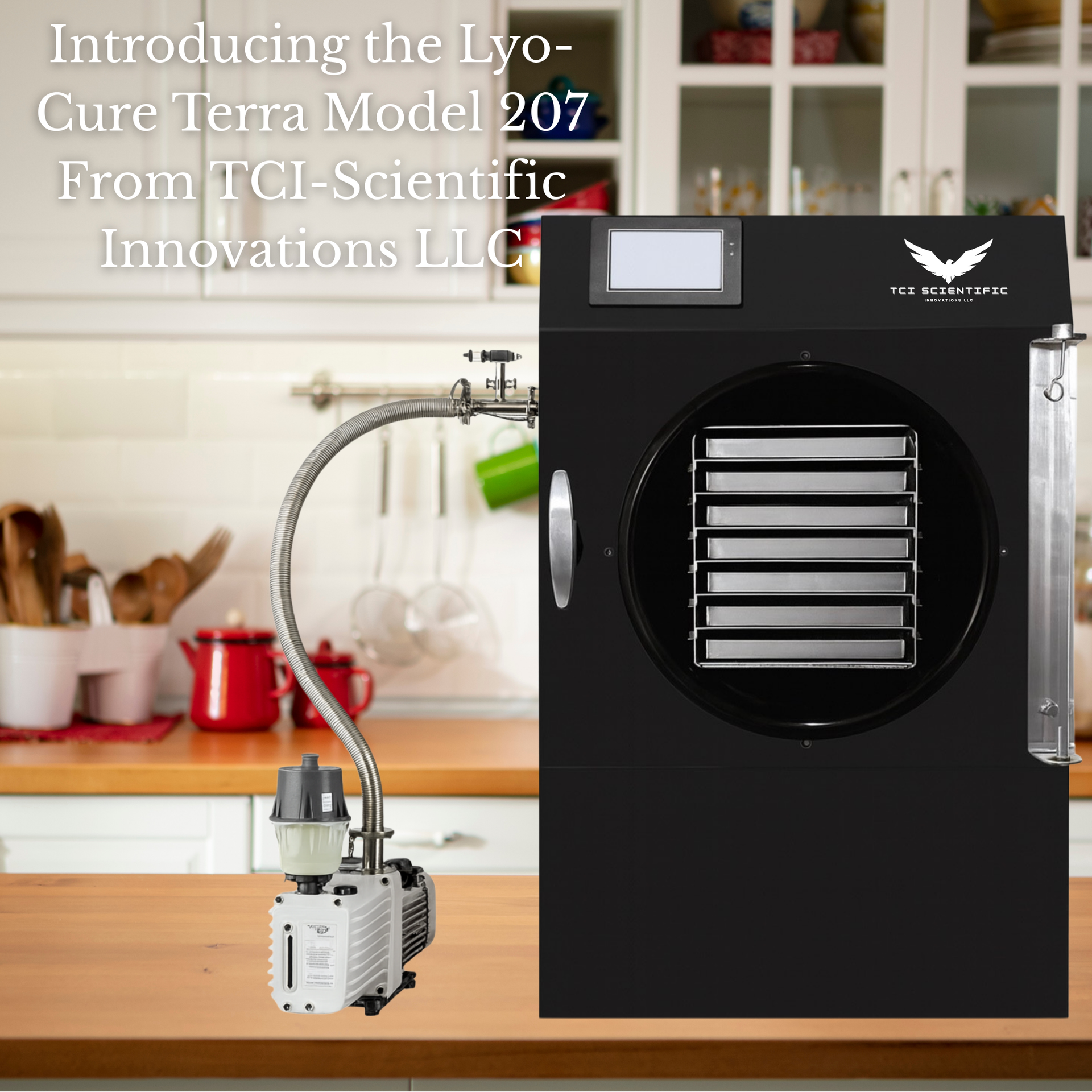 Black freeze dryer on a kitchen counter, with a vacuum pump attached.