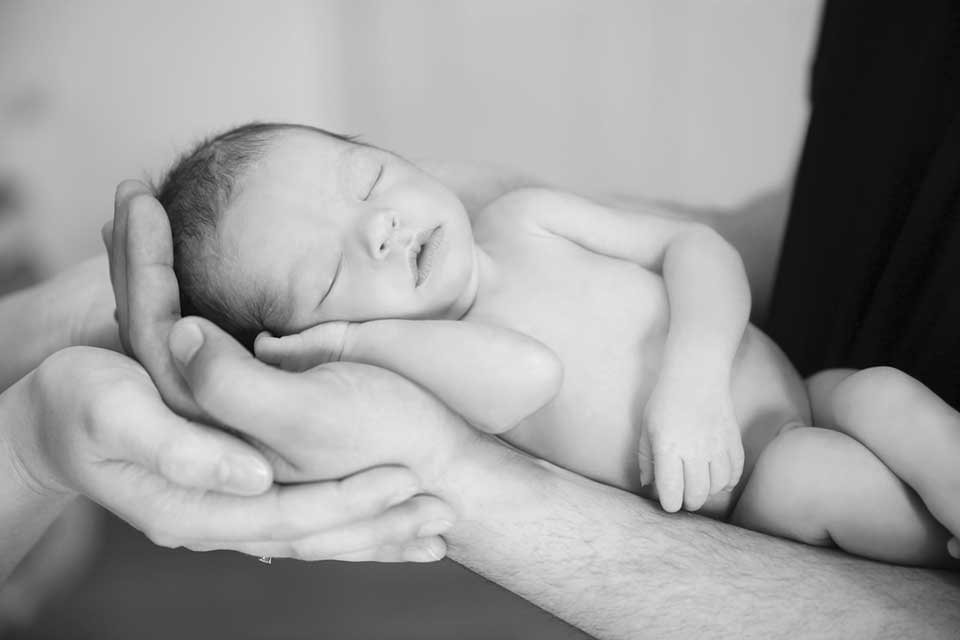 mother holding newborn baby - Heavenly Hands Birthing Center