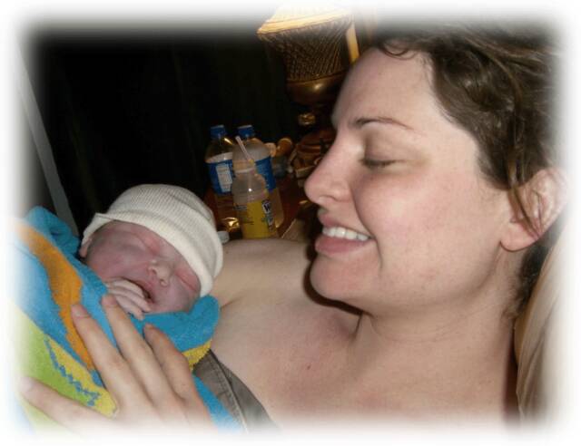 newborn baby cuddling with mother - Heavenly Hands Birthing Center