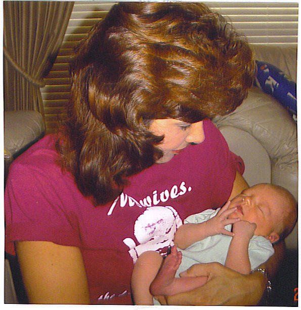 mother holding newborn baby - Heavenly Hands Birthing Center