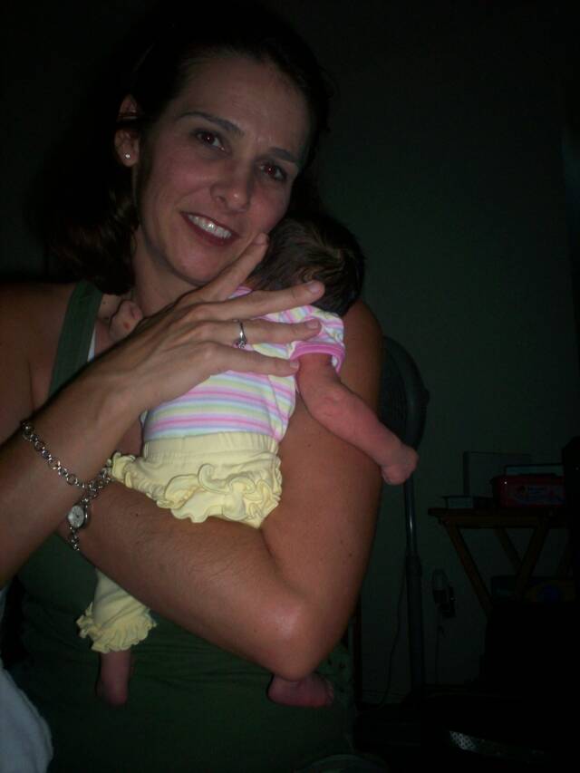 mother holding newborn baby - Heavenly Hands Birthing Center