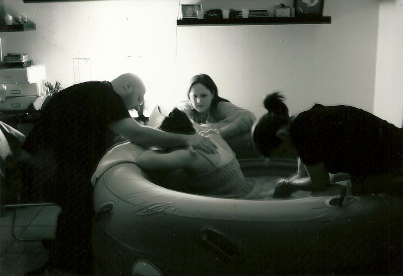 mother laboring in water birth - Heavenly Hands Birthing Center
