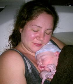 mother hugging newborn baby - Heavenly Hands Birthing Center