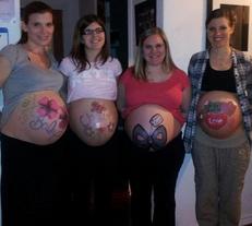 pregnant mothers with painted stomachs - Heavenly Hands Birthing Center