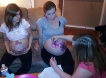painting pregnant mother's stomachs - Heavenly Hands Birthing Center