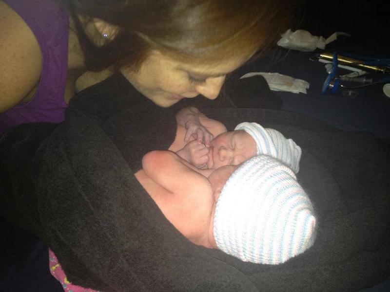 newborn twins wrapped together in a towel - Heavenly Hands Birthing Center