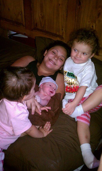 mother and children with newborn baby - Heavenly Hands Birthing Center