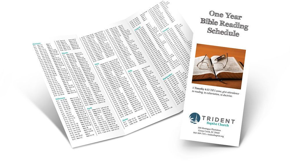 One-year Bible reading schedule, open and folded; Trident Seminars logo and book image visible.