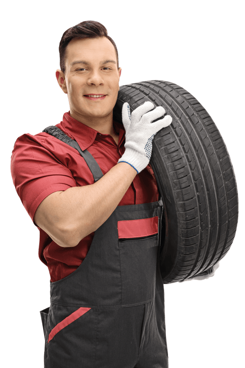 Mechanic Holding Huge Tire — New Brighton, PA — Junction Auto Service