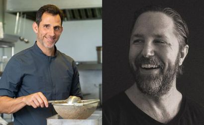 Two men, one in a kitchen, one with a beard, smiling.