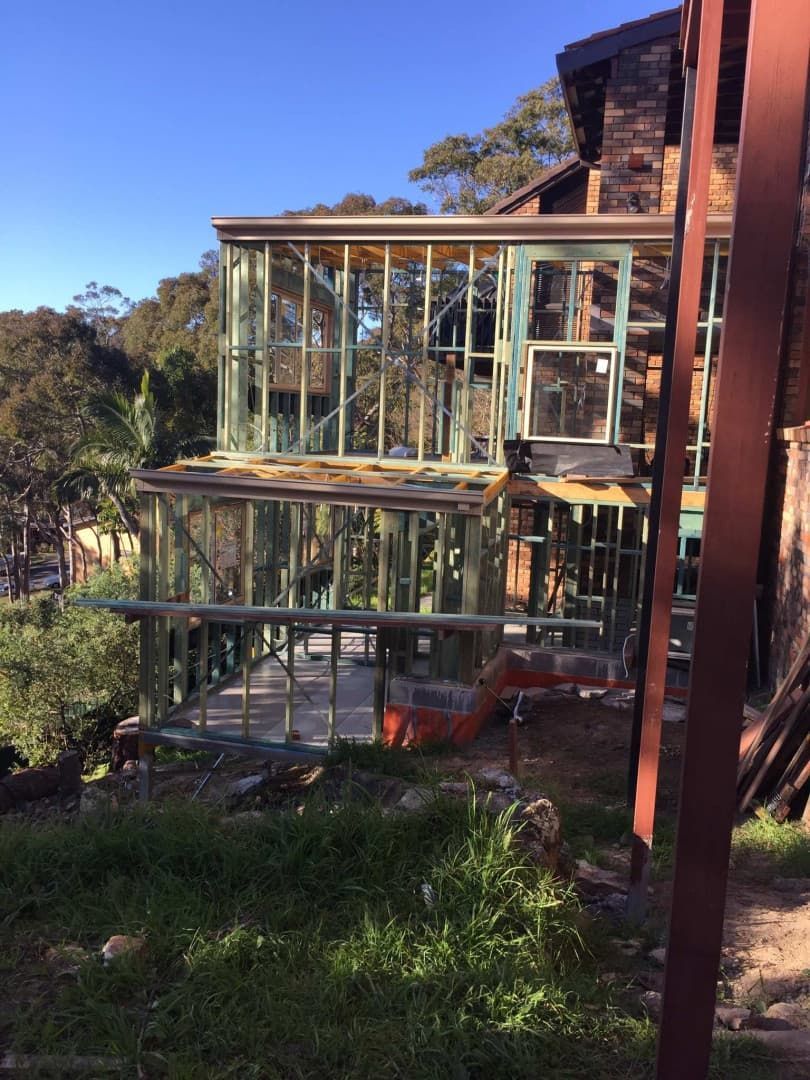 A Two-story House Under Construction With Exposed Timber Framing — Taddeo Constructions in Kiama, NSW