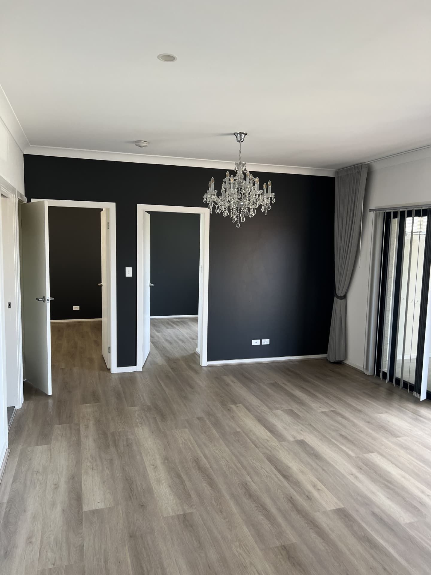 An Interior View of a Room With Wood-look Floors — Taddeo Constructions in Gerringong, NSW
