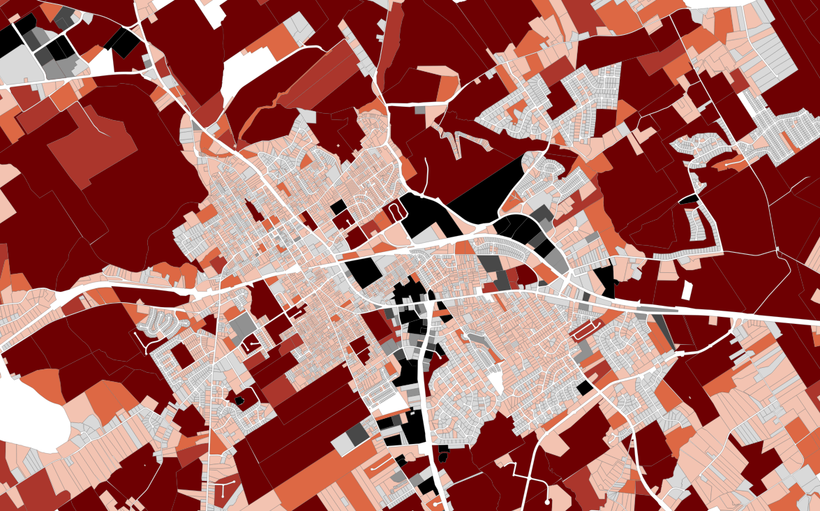 A parcel map showing cost-of-service deficits in red and surpluses in black for each parcel.
