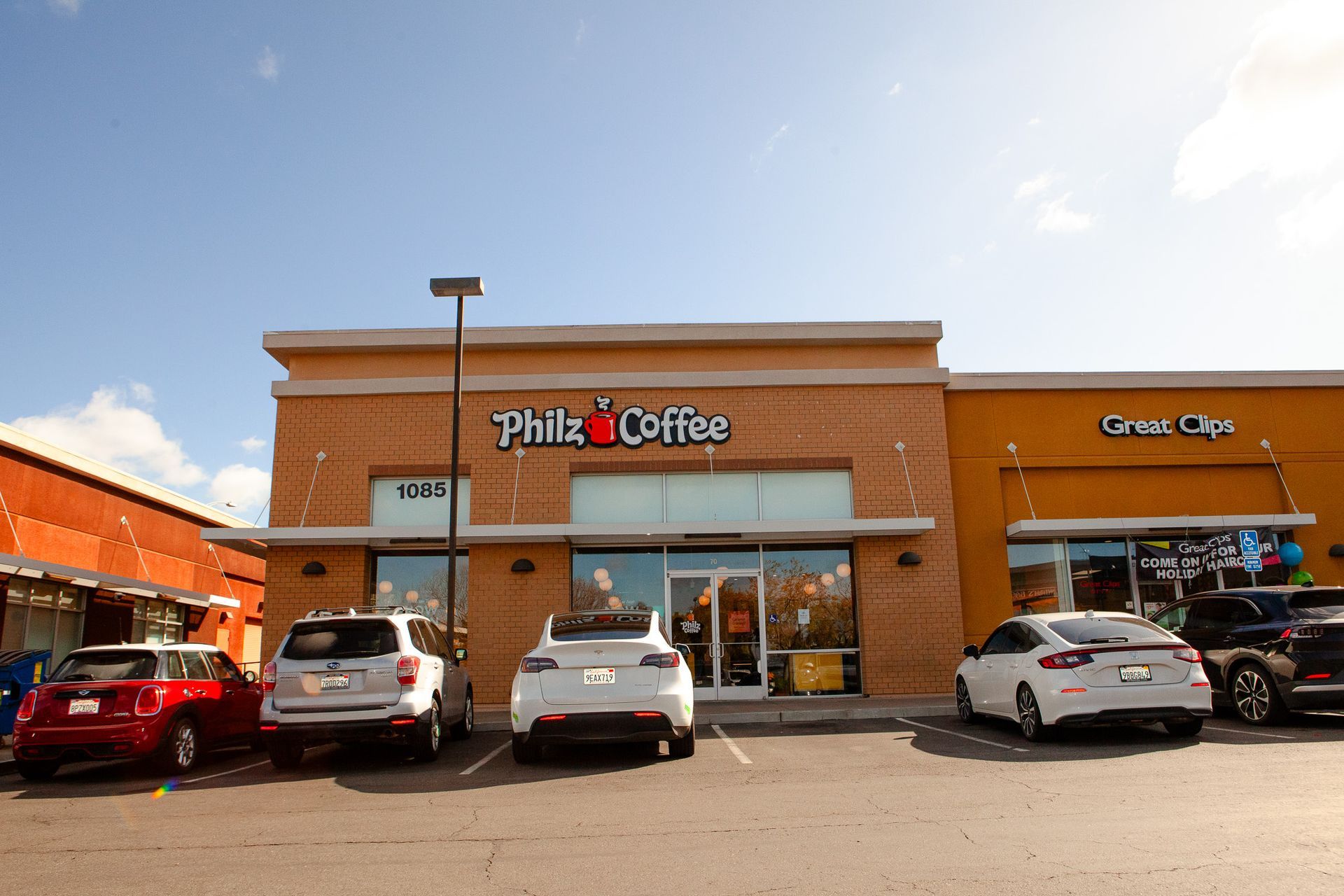 Awnica photographing her client's headshots in the studio