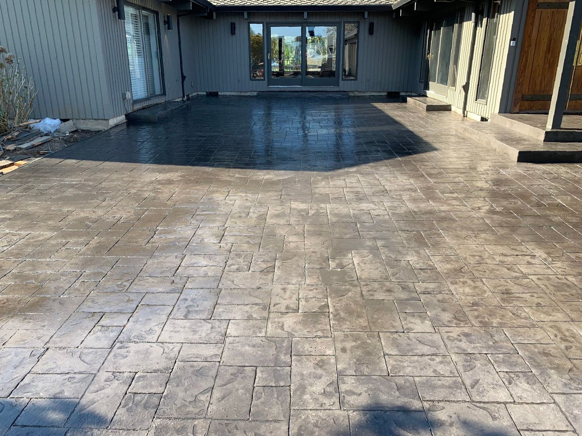 a stamped concrete patio in front of a house in Portland OR