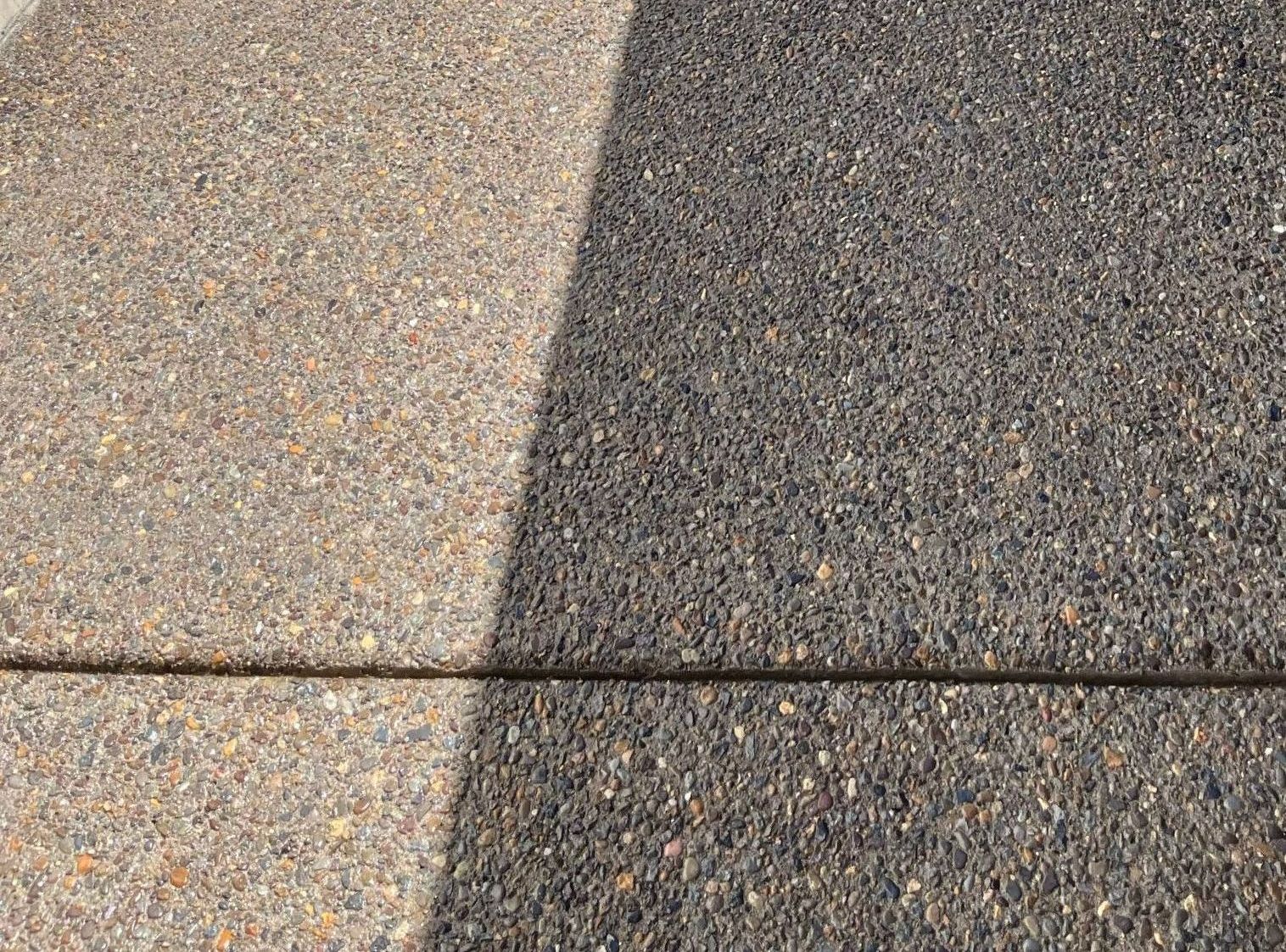 a close up of a concrete sidewalk with a shadow on it in Portland OR