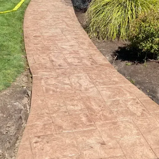 A large house with a patio and stairs in front of it in Portland OR