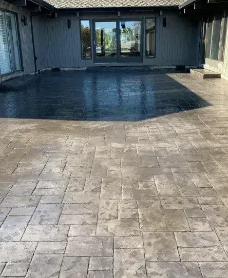 A house with a stamped concrete driveway.