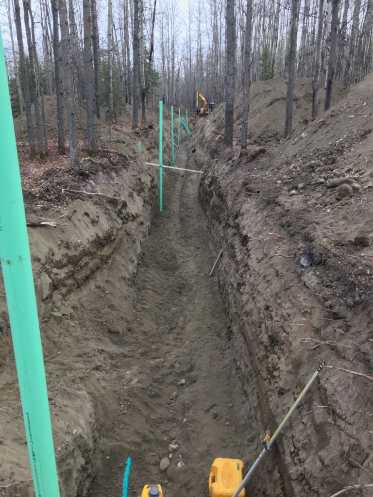trenching services to run piping for the cistern system